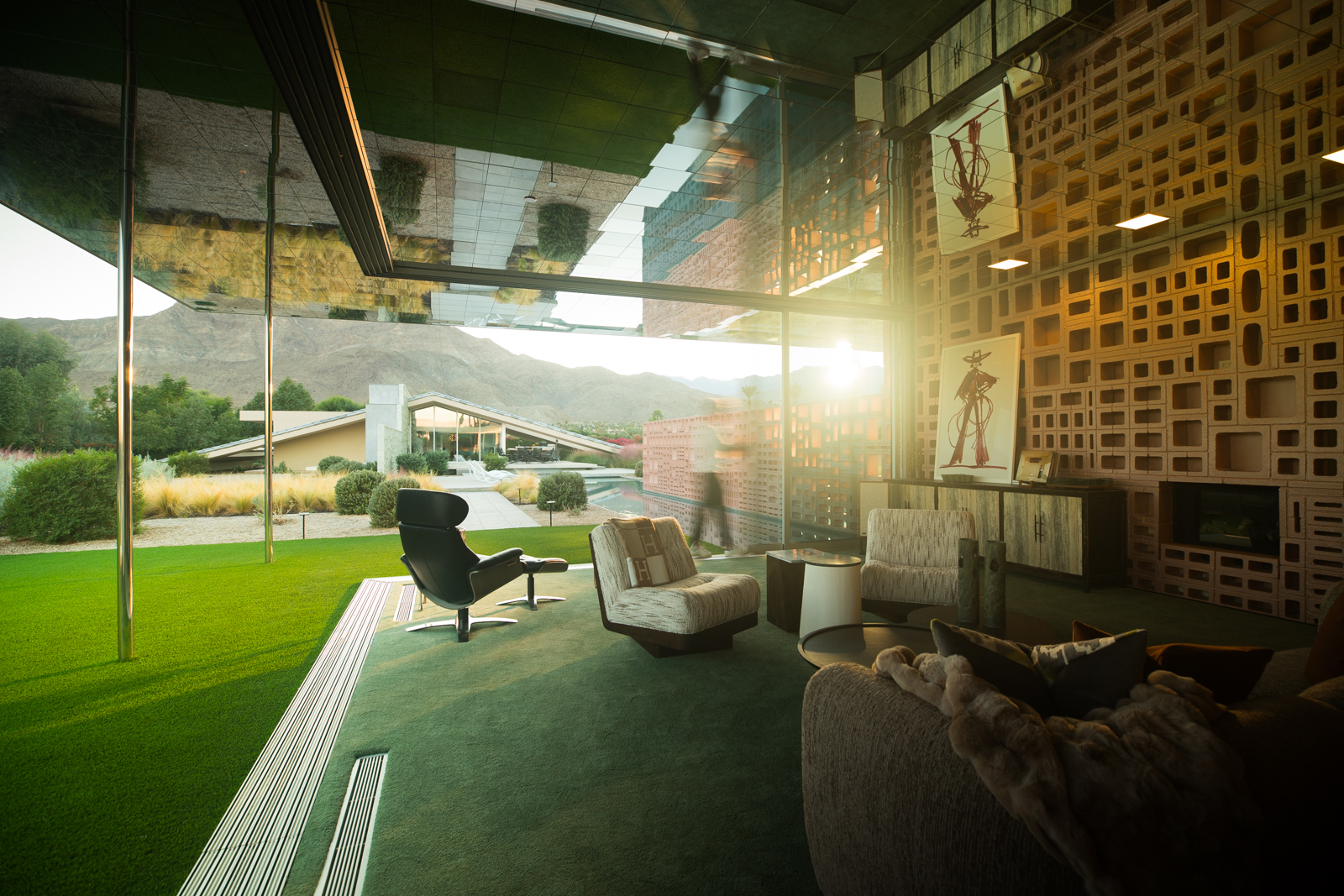 Golden desert light moving across the Dreamer Estate interior.