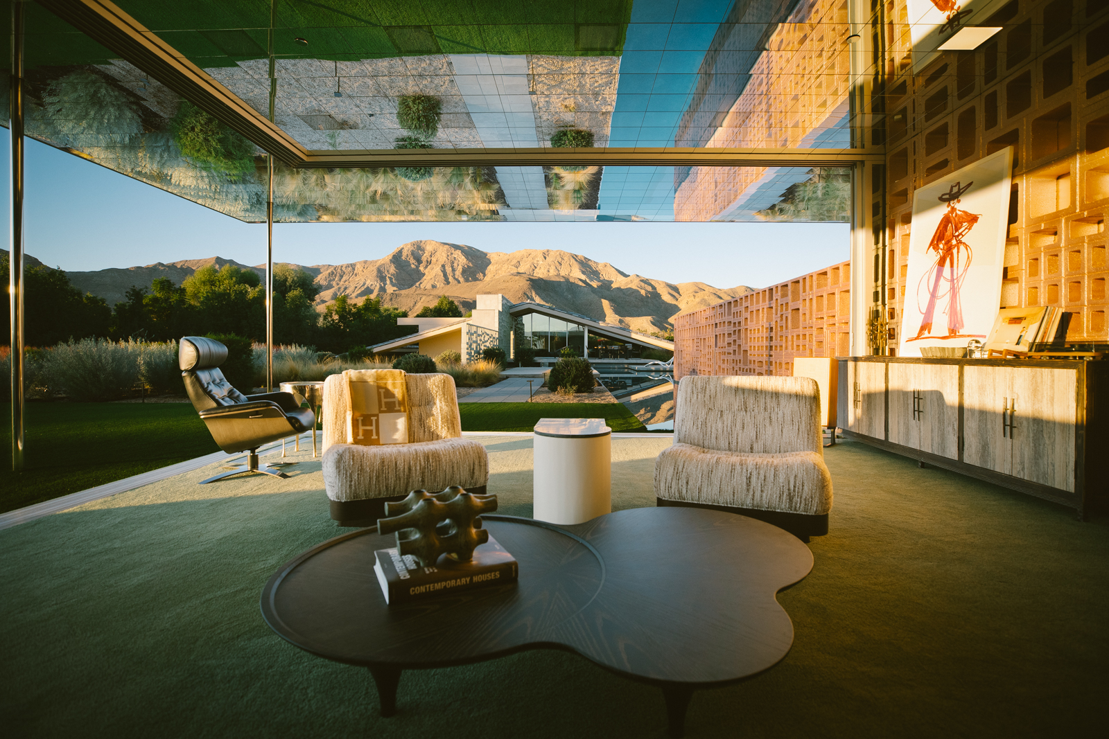 Great room facing the San Jacinto Mountains at golden hour.